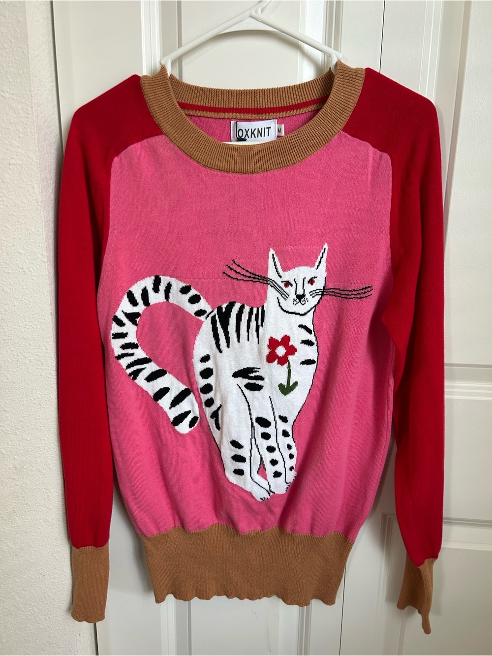 OXKNIT Pink Cat Intarsia Crewneck Sweater with Red Sleeves